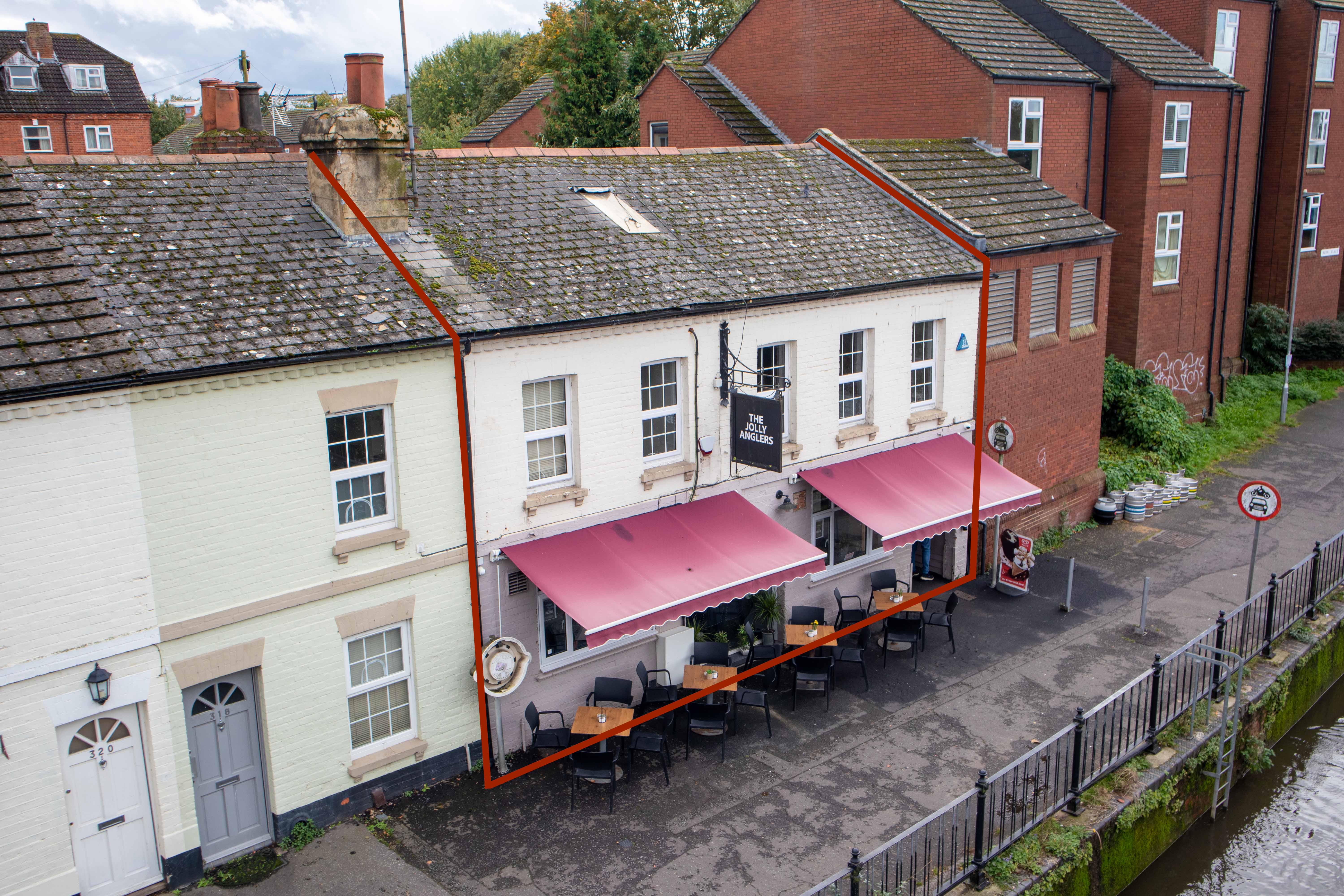 Riverside pub and development site for sale